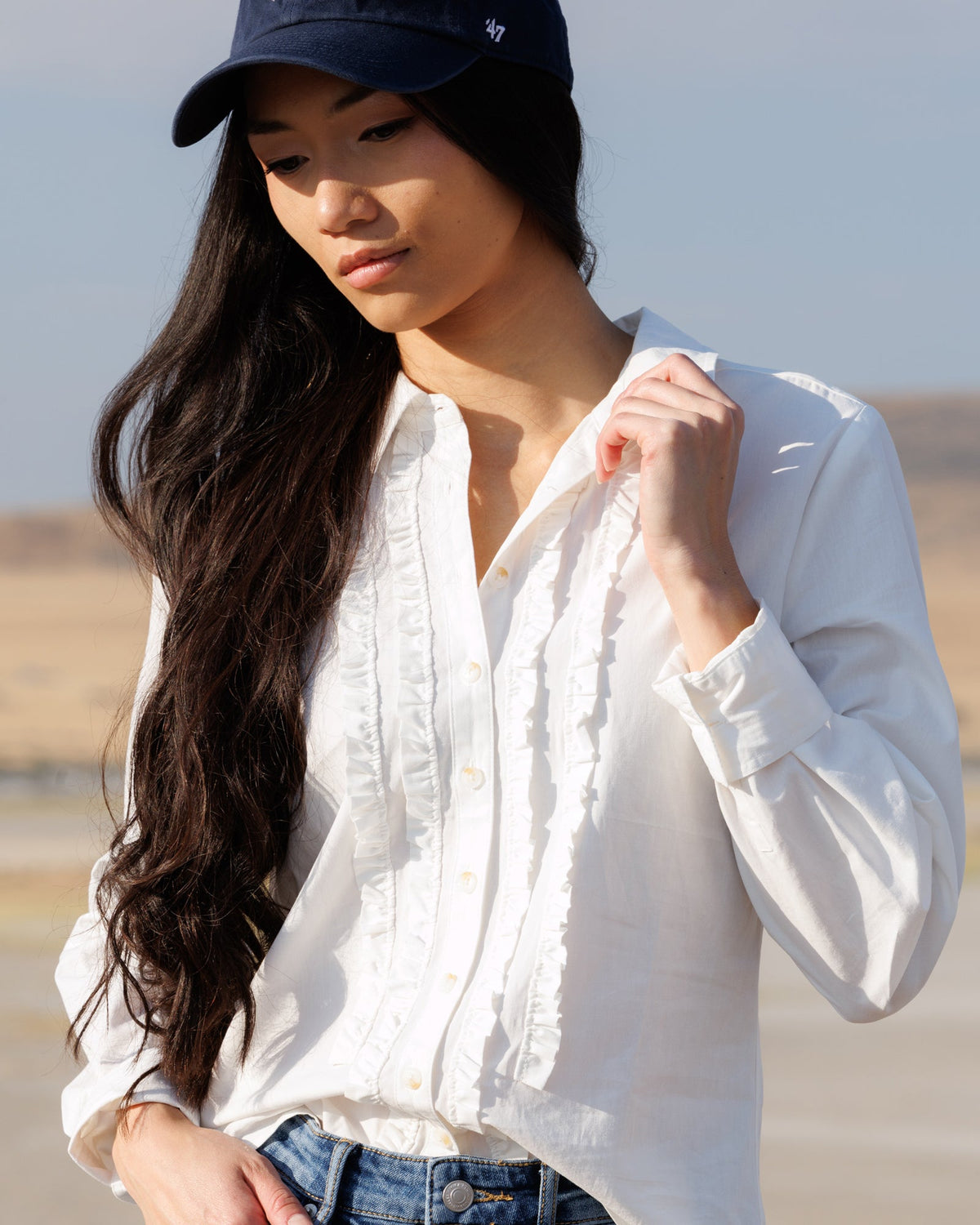 Downeast Signature Tuxedo Button Down top featuring a classic collar, long sleeves, and tailored fit, perfect for formal or stylish occasions.