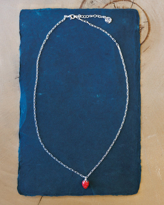 Silver Strawberry Fields Forever necklace by Downeast featuring a delicate strawberry pendant on a silver chain.