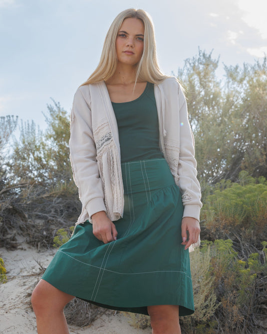 Downeast Trailblazer skirt in a stylish, casual design with a comfortable fit, displayed on a hanger.