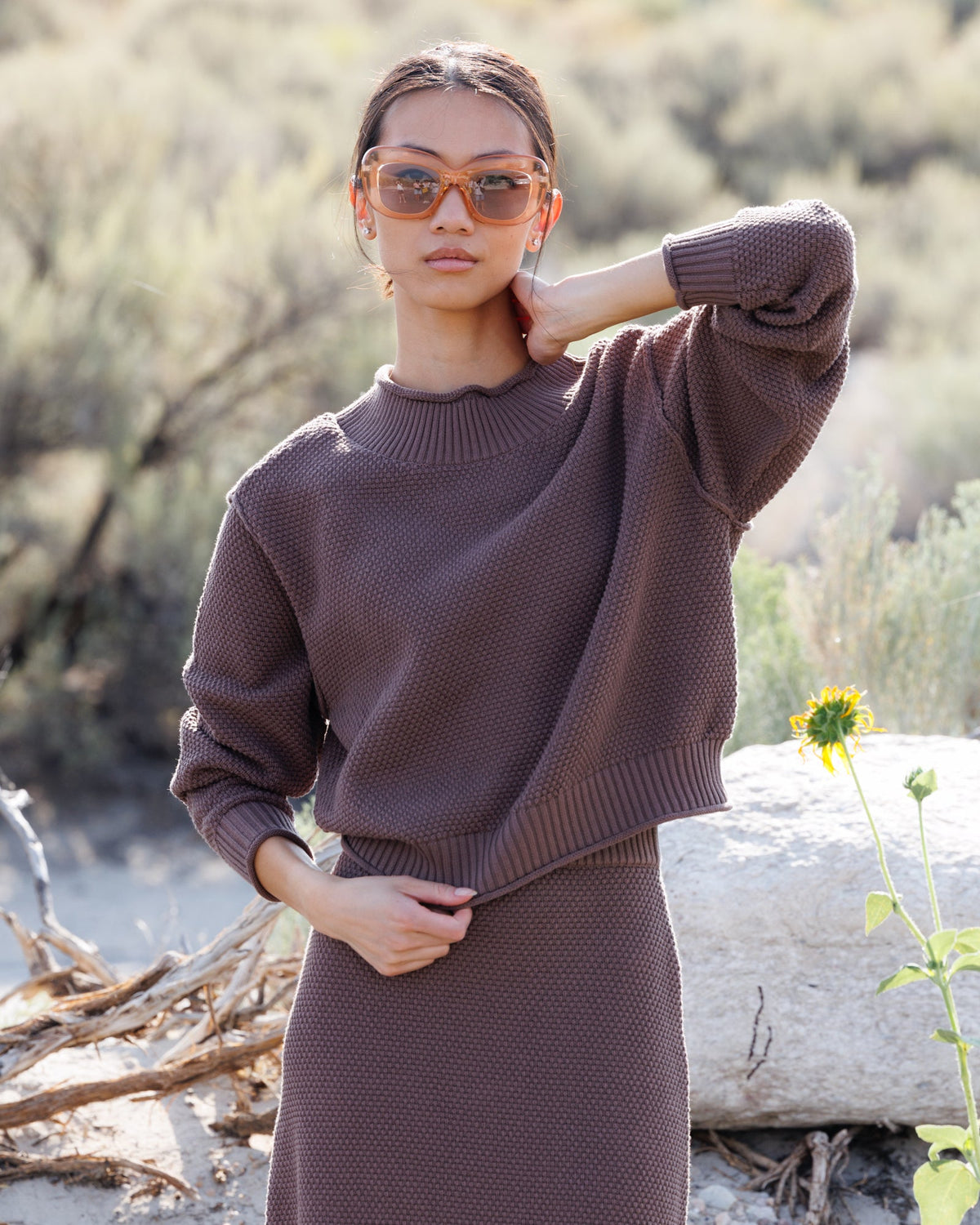 Downeast Carpe Diem sweater showing a cozy knit design with a round neckline and ribbed cuffs.