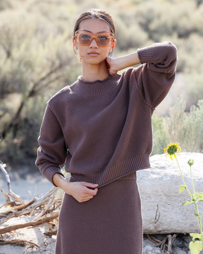 Downeast Carpe Diem sweater showing a cozy knit design with a round neckline and ribbed cuffs.