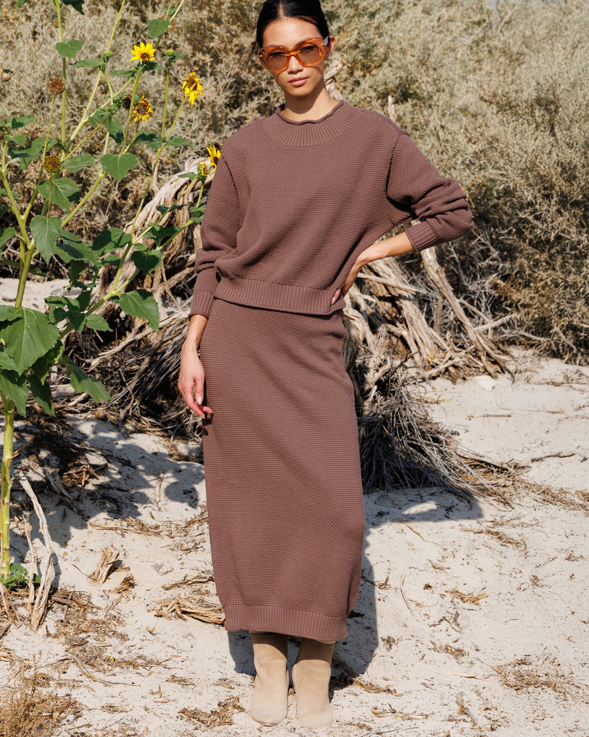 Downeast Carpe Diem skirt in soft fabric with a stylish, flowy design and elastic waistband, shown on a hanger.