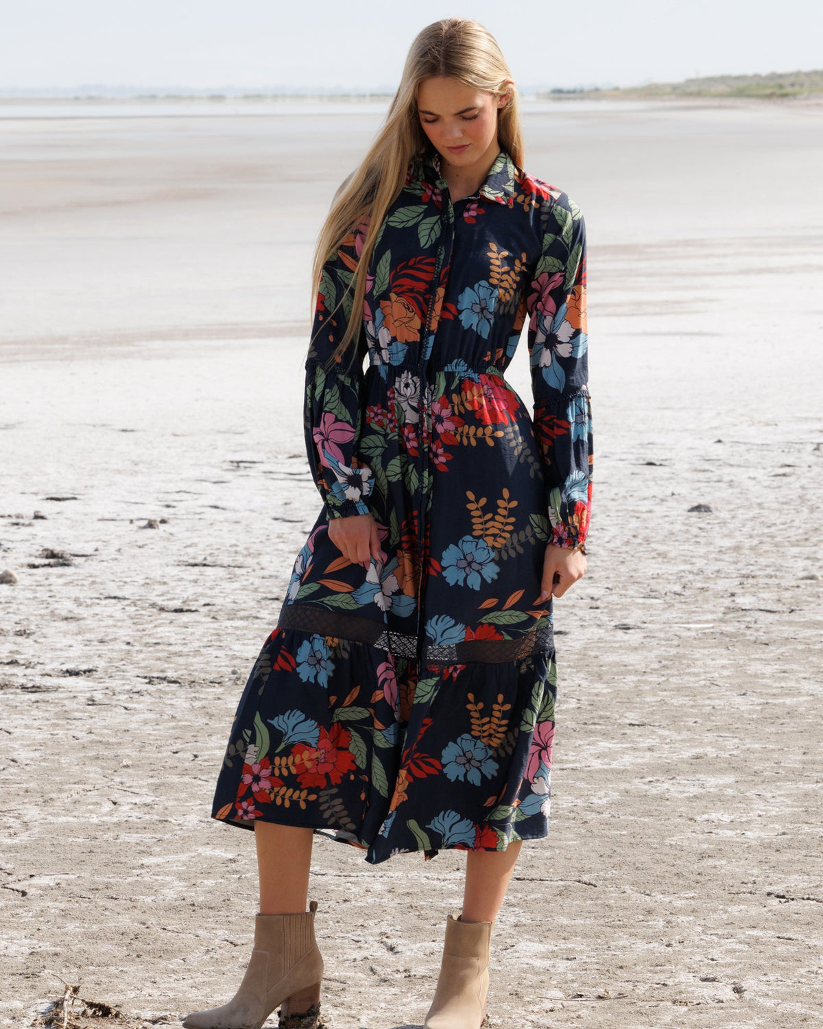 Downeast Wheatland Maxi Dress shown with flowing fabric and sleeveless design, perfect for casual or summer wear.