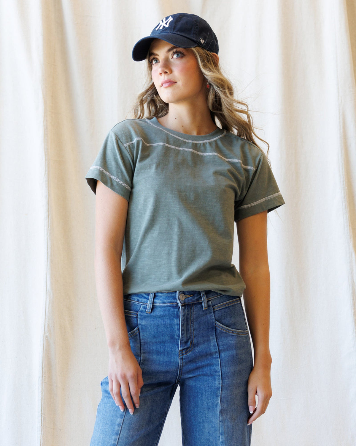 Downeast cheer section tee, casual tops in vibrant color, featuring a comfortable fit and cheerful design for team spirit.