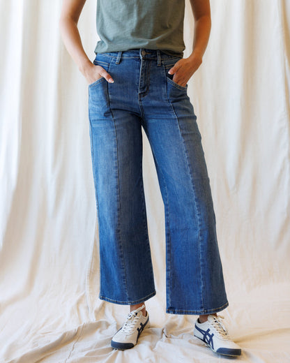 Downeast high rise seamed wide leg ankle denim jeans displayed on a model, showing the stylish fit and detailing.