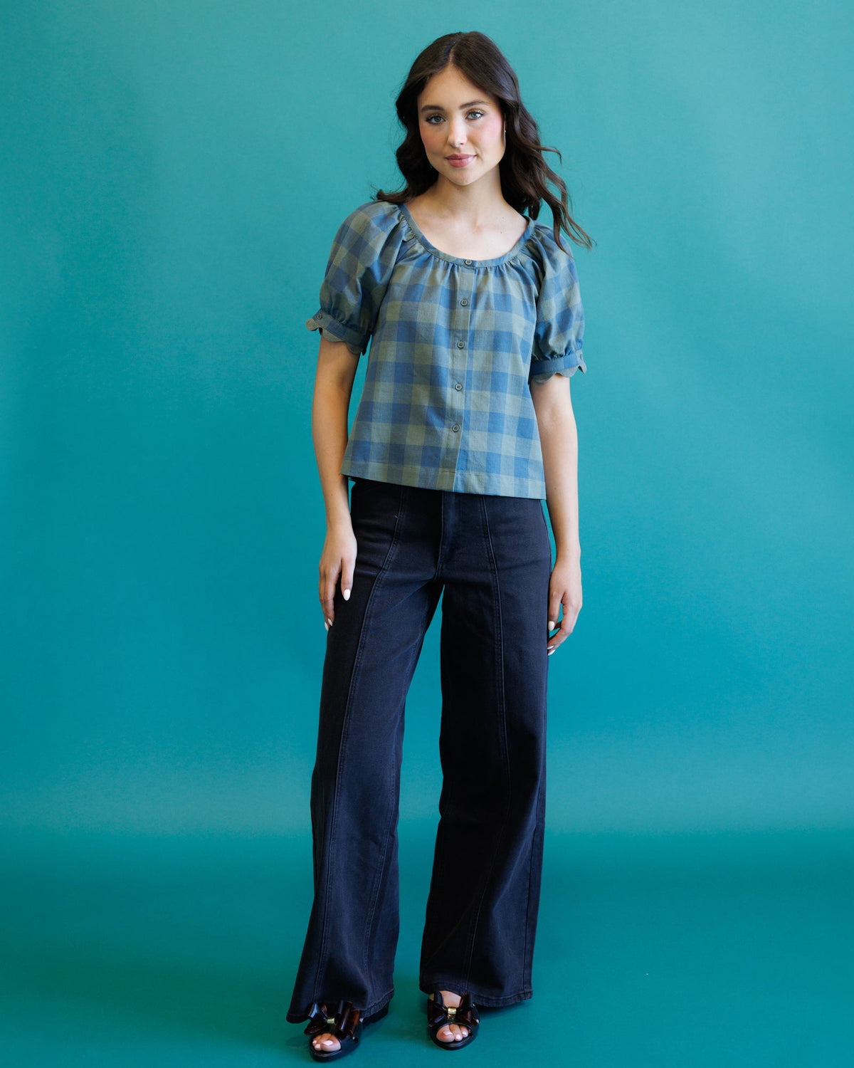 Downeast high rise seamed denim trousers with front and back seams, styled with a relaxed fit and classic denim wash.