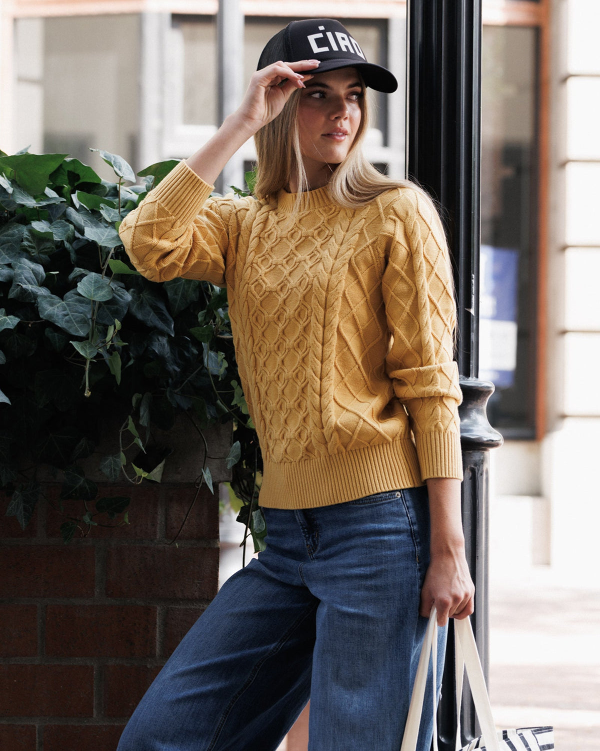 Downeast Glow On Sweater in soft knit fabric, featuring a cozy fit and stylish design, shown in a natural outdoor setting.