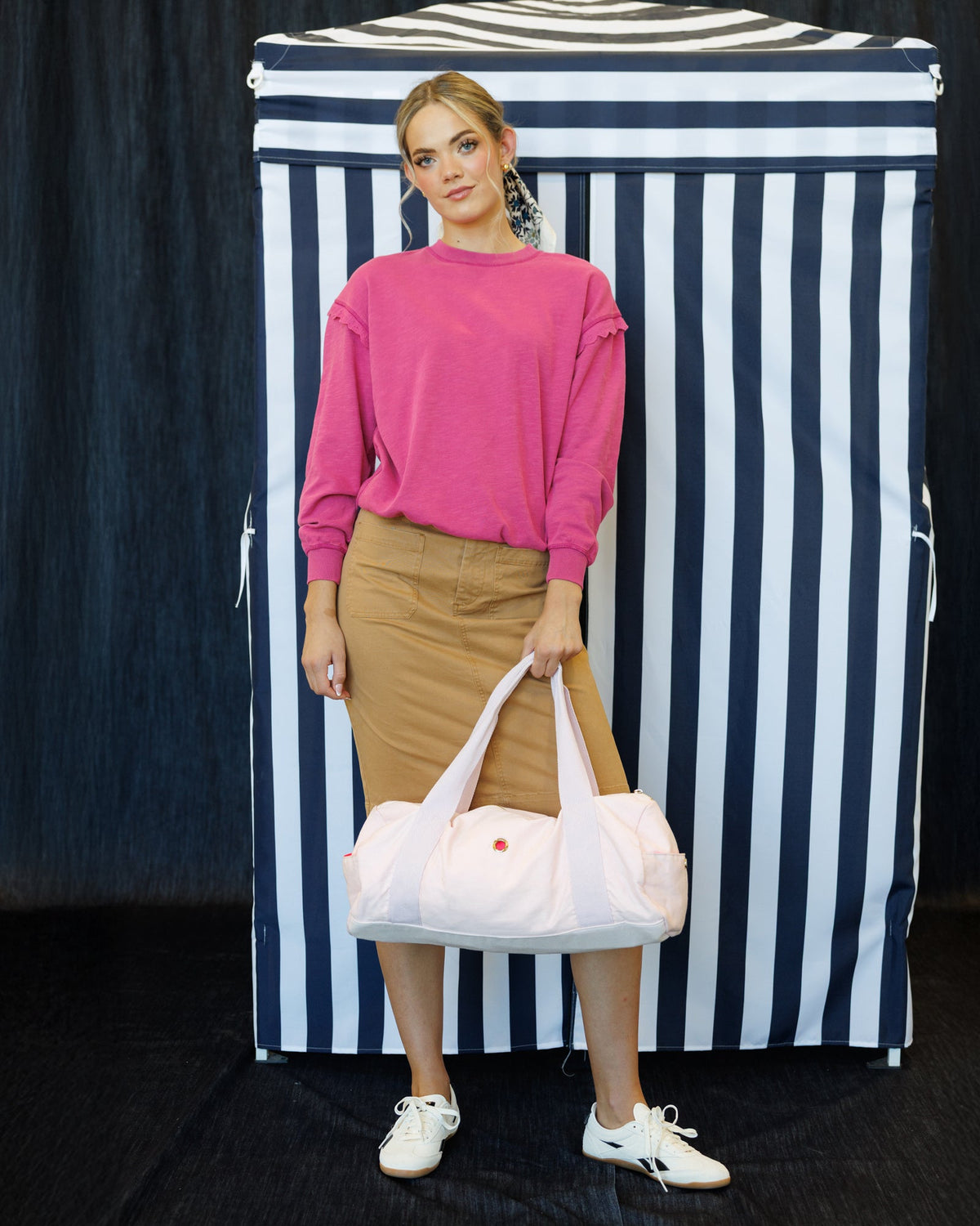 Downeast Prep & Pretty Pullover top, soft fabric with a relaxed fit, shown in a neutral color on a hanger.
