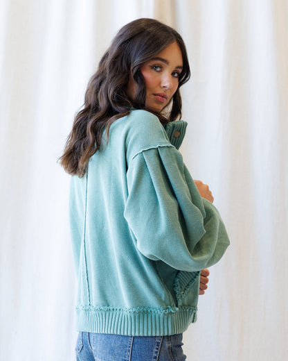 Downeast Campus Cardi Coat outerwear, stylish and warm with a quilted design, shown in a natural outdoor setting.