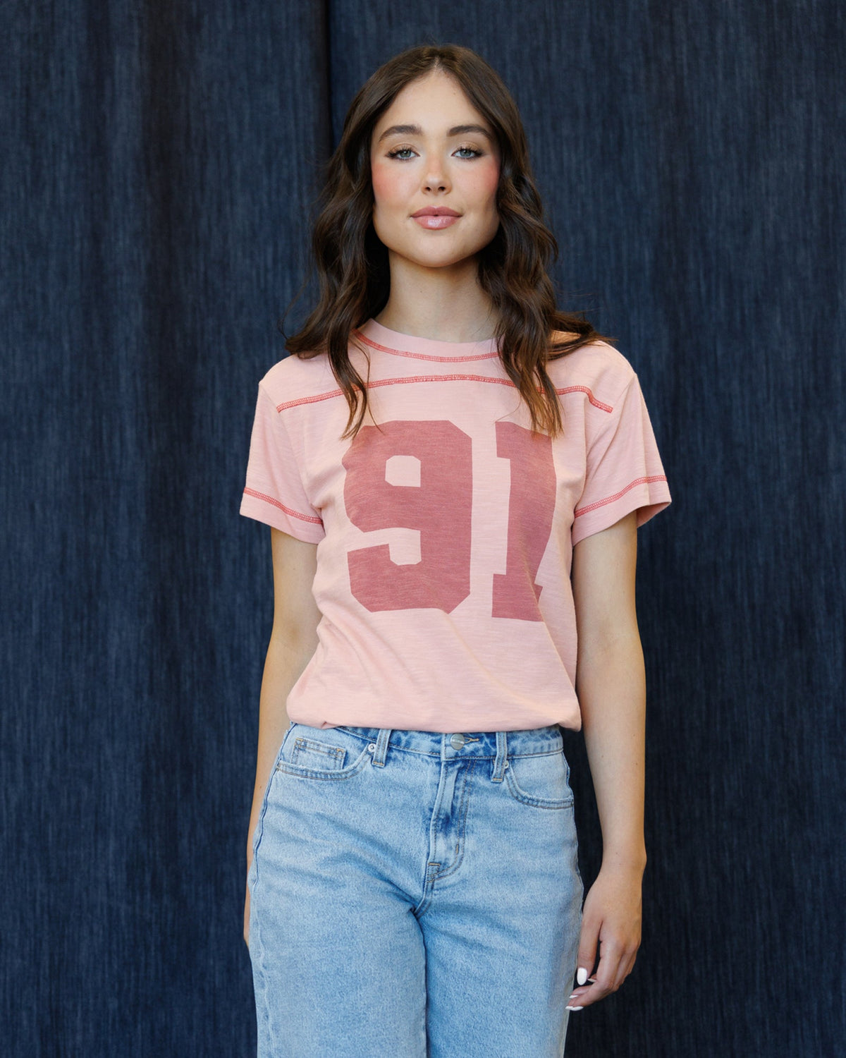 Downeast cheer section tee in colorful cotton, featuring team spirit design, perfect for casual wear and supporting your squad.