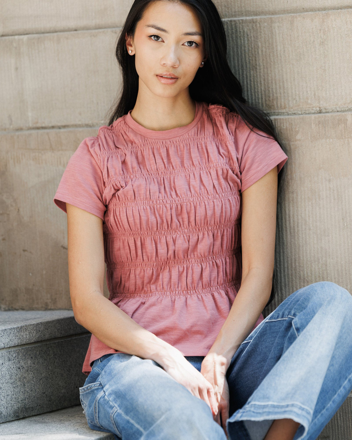 Downeast smocked tee top featuring a fitted style with smocked detailing and short sleeves, perfect for casual wear.