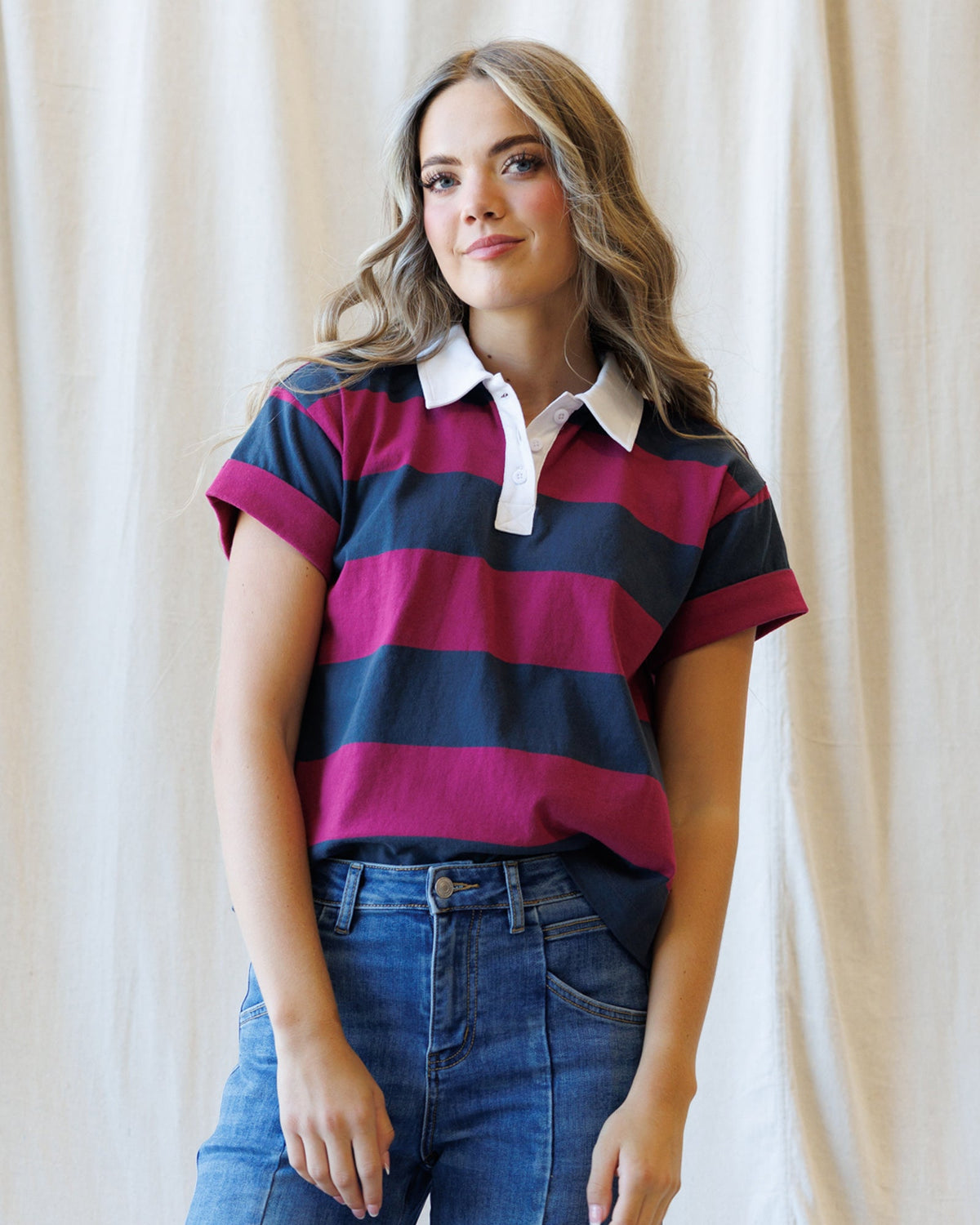 Downeast rugby tee shirt for men, featuring a classic design and comfortable fit, shown in a casual outdoor setting.