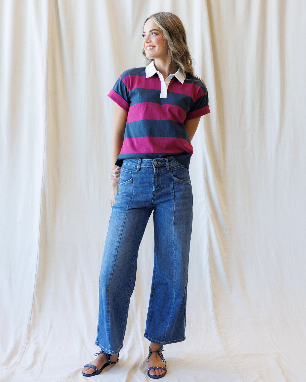 Downeast high rise seamed wide leg ankle denim jeans with visible stitching and a relaxed fit.