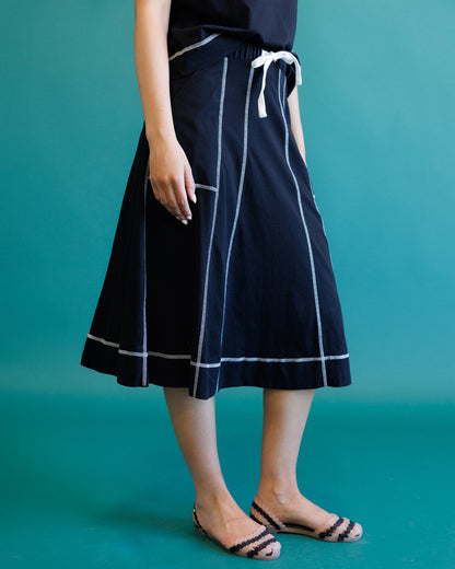 Downeast Major Score skirt in a stylish design, shown in a close-up image highlighting the fabric and pattern details.