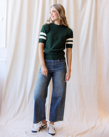 Downeast Team Spirit Crew sweater in heather gray with team logo, soft knit fabric, crew neck, and long sleeves.