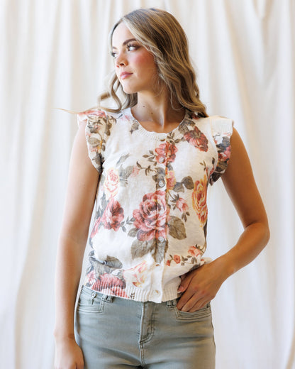 Downeast Good Call cardigan sweater in soft knit fabric, displayed on a hanger with a button-up front and cozy fit.