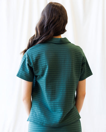 Downeast Du Jour Polo top in soft fabric, featuring a classic collar and short sleeves, displayed on a plain background.