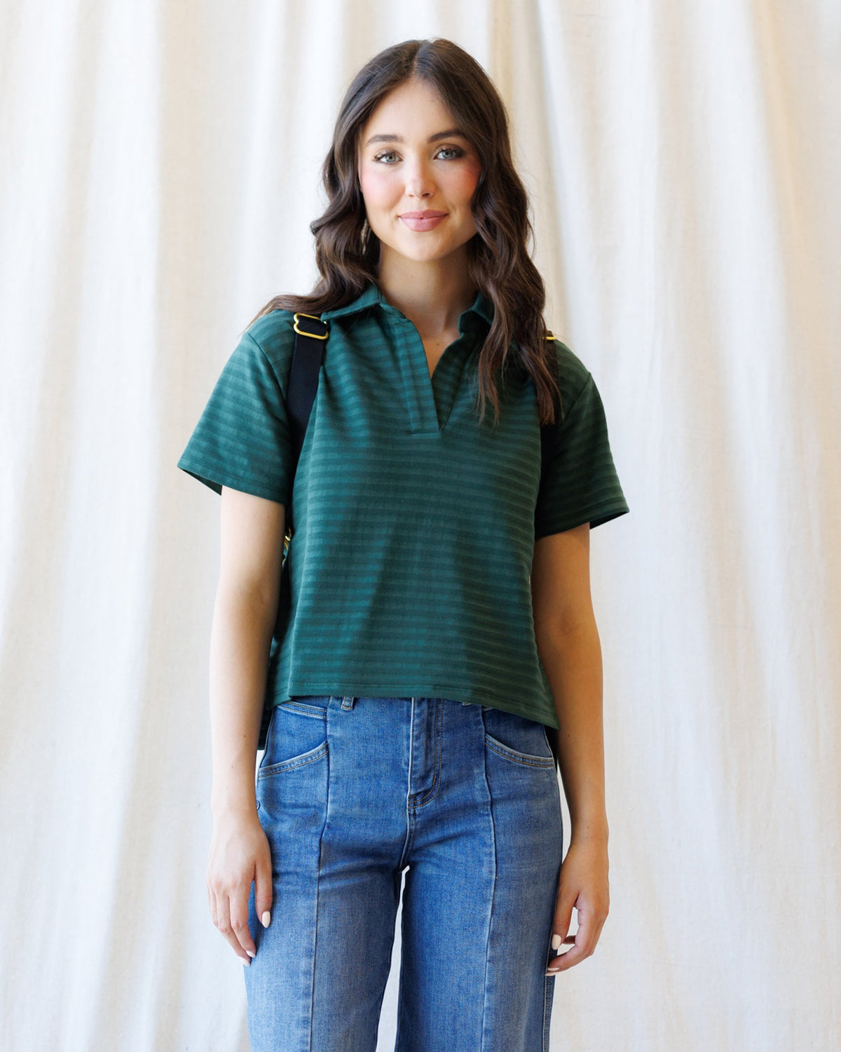 Downeast Du Jour Polo top in soft fabric, featuring a classic collar and button placket, displayed on a plain background.
