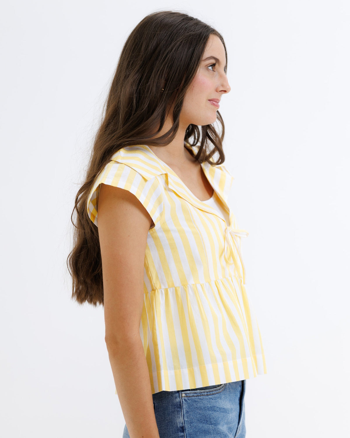 Downeast Sunshine Stripe Top, women's casual long-sleeve blouse with bright yellow and white horizontal stripes, front view.