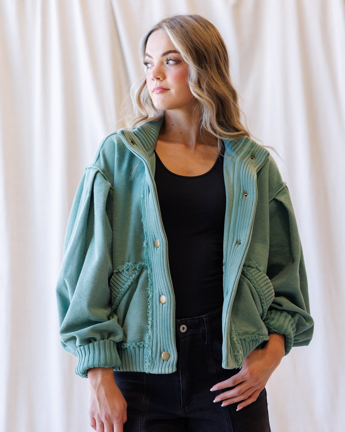 Downeast Campus Cardi Coat, a stylish outerwear piece with a cozy knit design and button closure, suitable for cold weather.