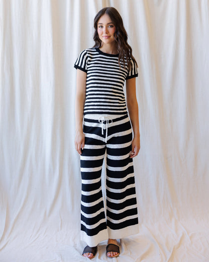 Downeast Round Trip Pants showing a relaxed fit, with a smooth fabric finish and classic style, ideal for casual wear.