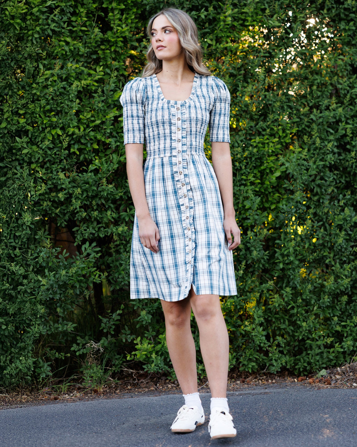 Downeast Oxford dress displayed on a hanger, featuring a classic button-up style with a collar and long sleeves.