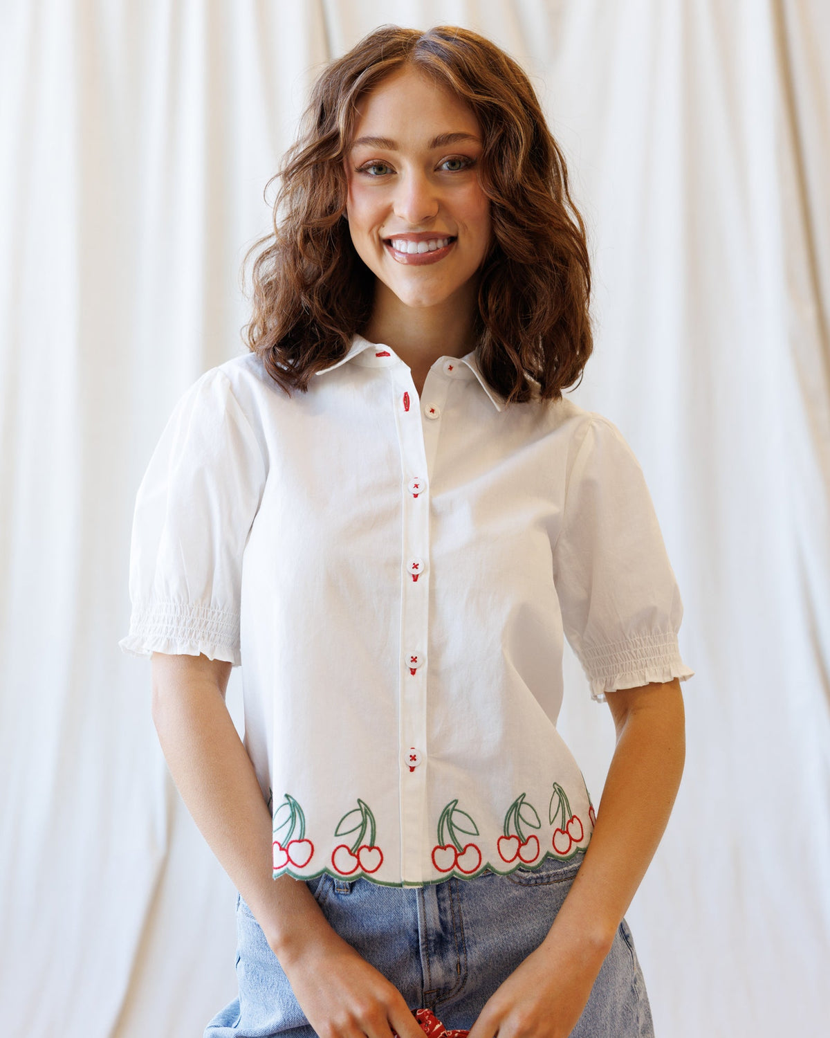 Cherry Cute Button Down top by Downeast featuring a cherry print, long sleeves, and classic button-up style.