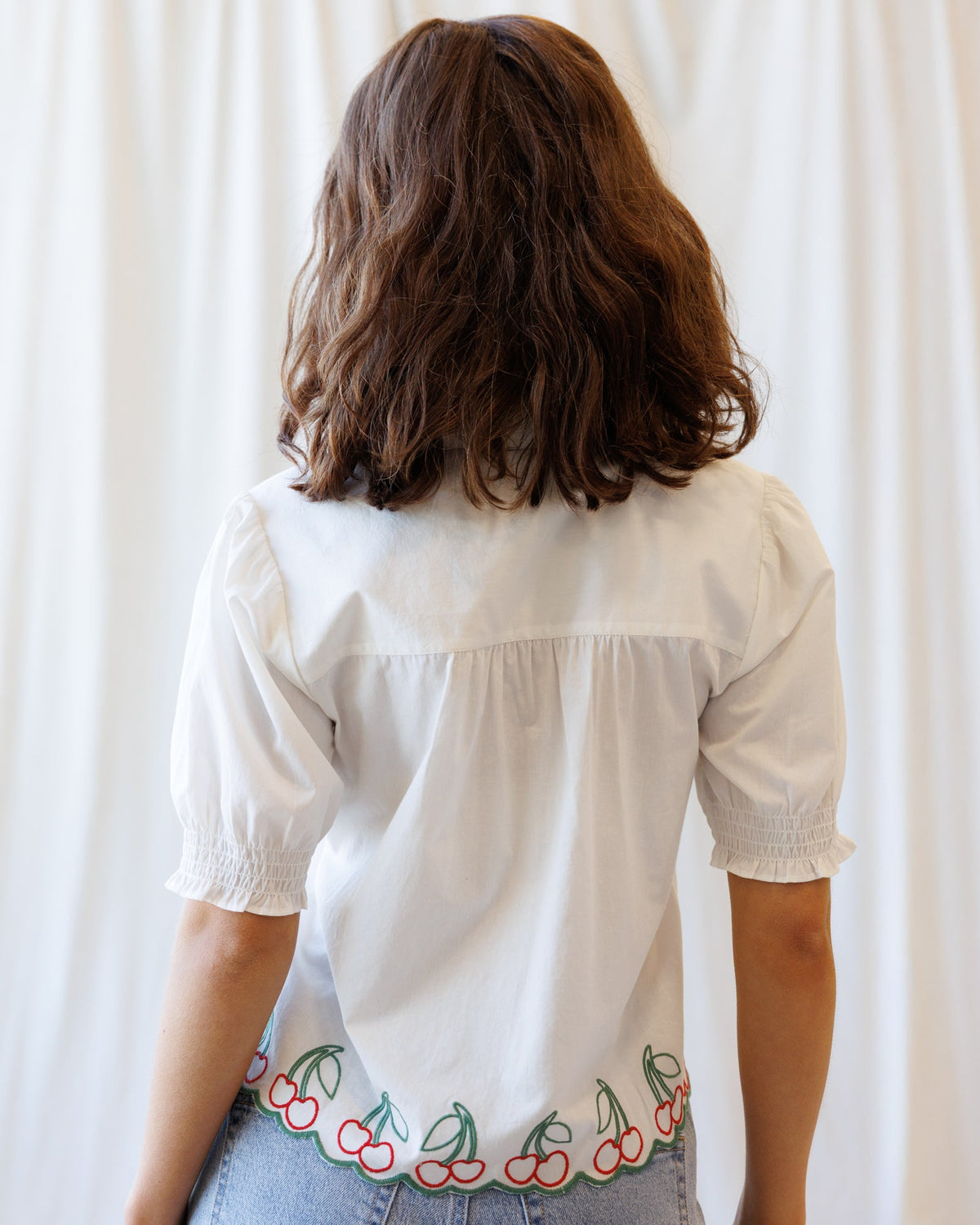 Cherry Cute Button Down top by Downeast featuring a cherry print, long sleeves, and classic collar for a stylish casual look.