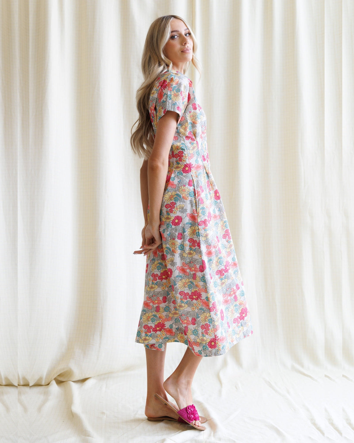 Downeast pleated shirtdress with long sleeves and button front, stylish and lightweight for casual wear.
