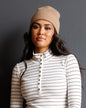 Downeast Alpine Beanie hat in cozy knit with folded brim and brand logo, perfect for cold weather.