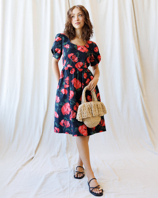 Downeast Signature Sun Dress, sleeveless summer dress with floral pattern, lightweight fabric, and relaxed fit.