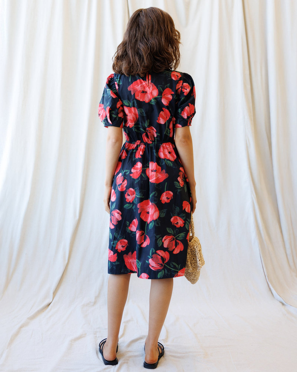 Downeast Signature Sun Dress, lightweight sleeveless summer dress with floral print and adjustable straps, perfect for warm weather.