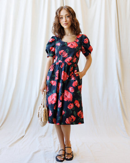 Downeast Signature Sun Dress with floral pattern, sleeveless design, and V-neck, perfect for summer wear.