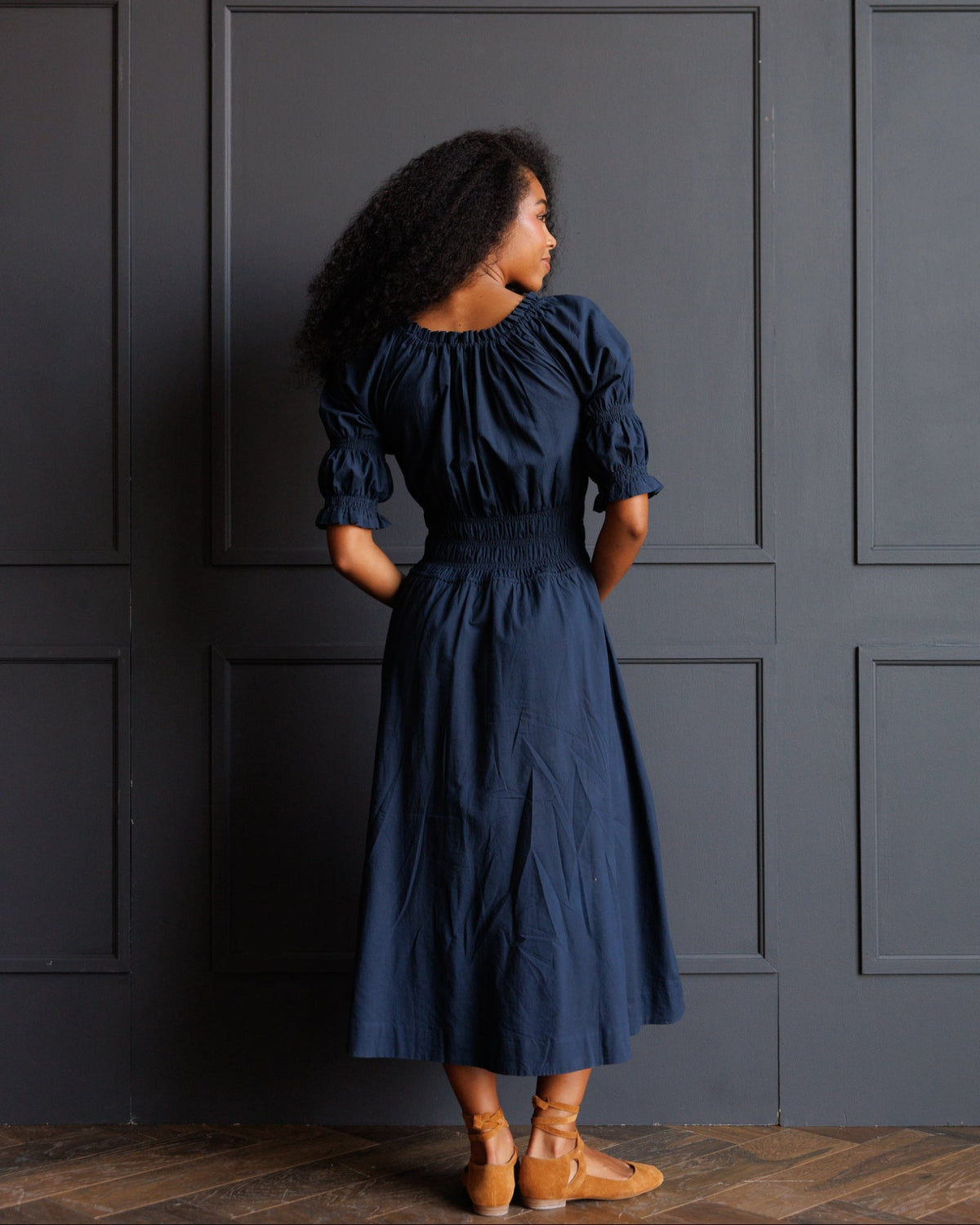 Downeast Long Way Home Dress in blue nights, a stylish women's dress with flowing fabric and elegant design.