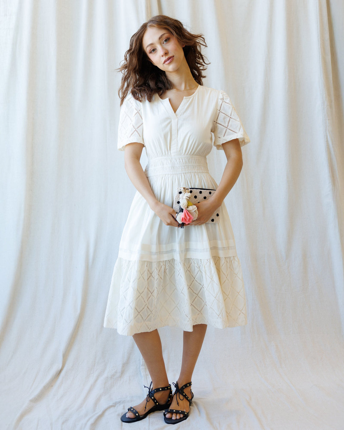 Downeast Icon Demi Lace Dress displayed on model, showcasing elegant lace details and feminine fit for stylish occasions.