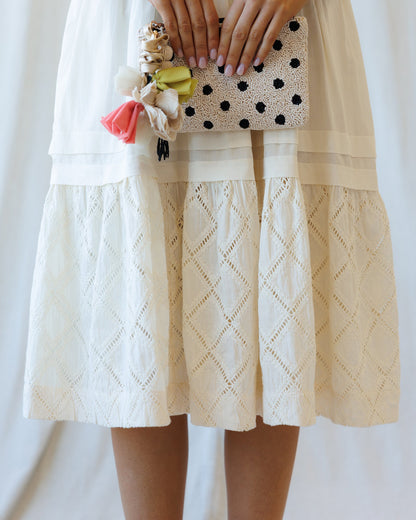 Downeast Icon Demi Lace Dress showing intricate lace details and flowy silhouette, perfect for elegant occasions.