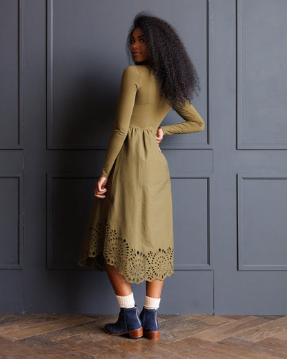 Embroidered hybrid dress by Downeast with floral embroidery, sleeveless design, and flowing fabric perfect for summer wear.
