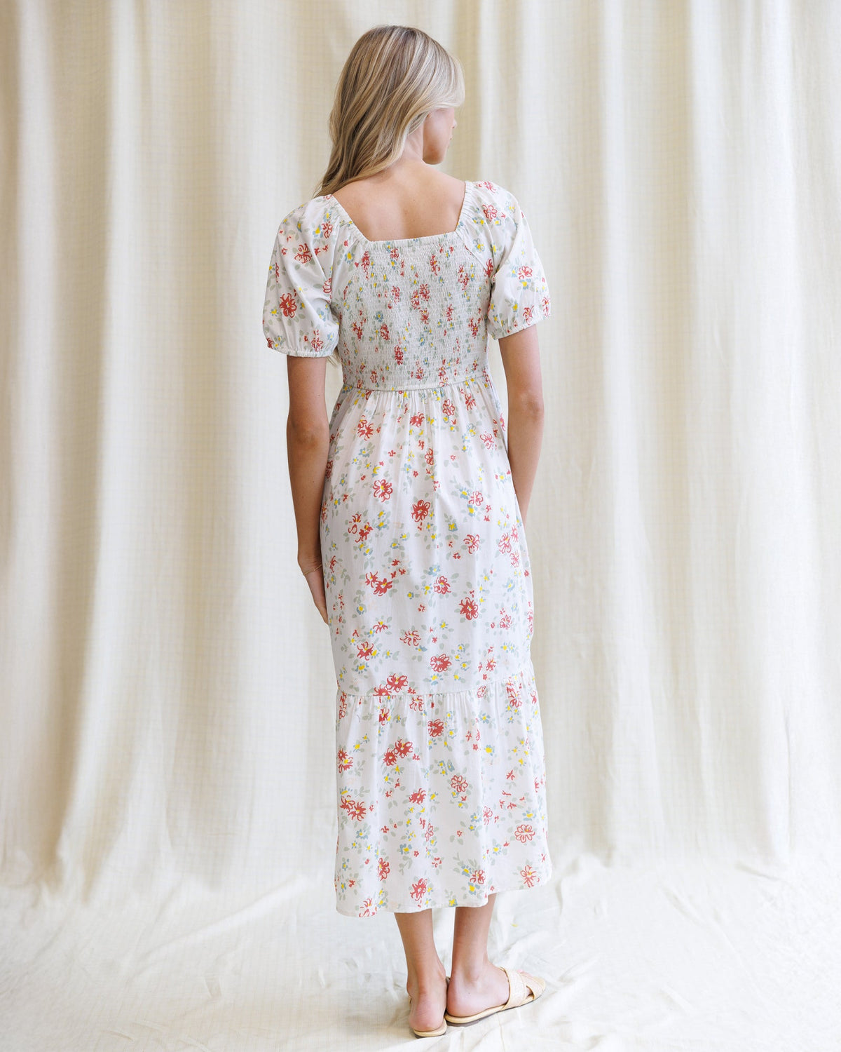Downeast High Tea Dress featuring a feminine silhouette, floral pattern, and elegant design, suitable for formal occasions.