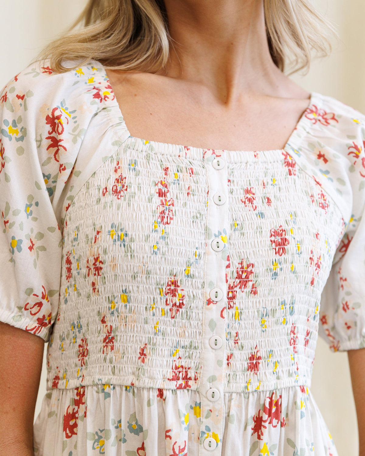 Downeast High Tea Dress, elegant floral dress with ruffled sleeves and knee-length hem, perfect for spring or summer occasions.