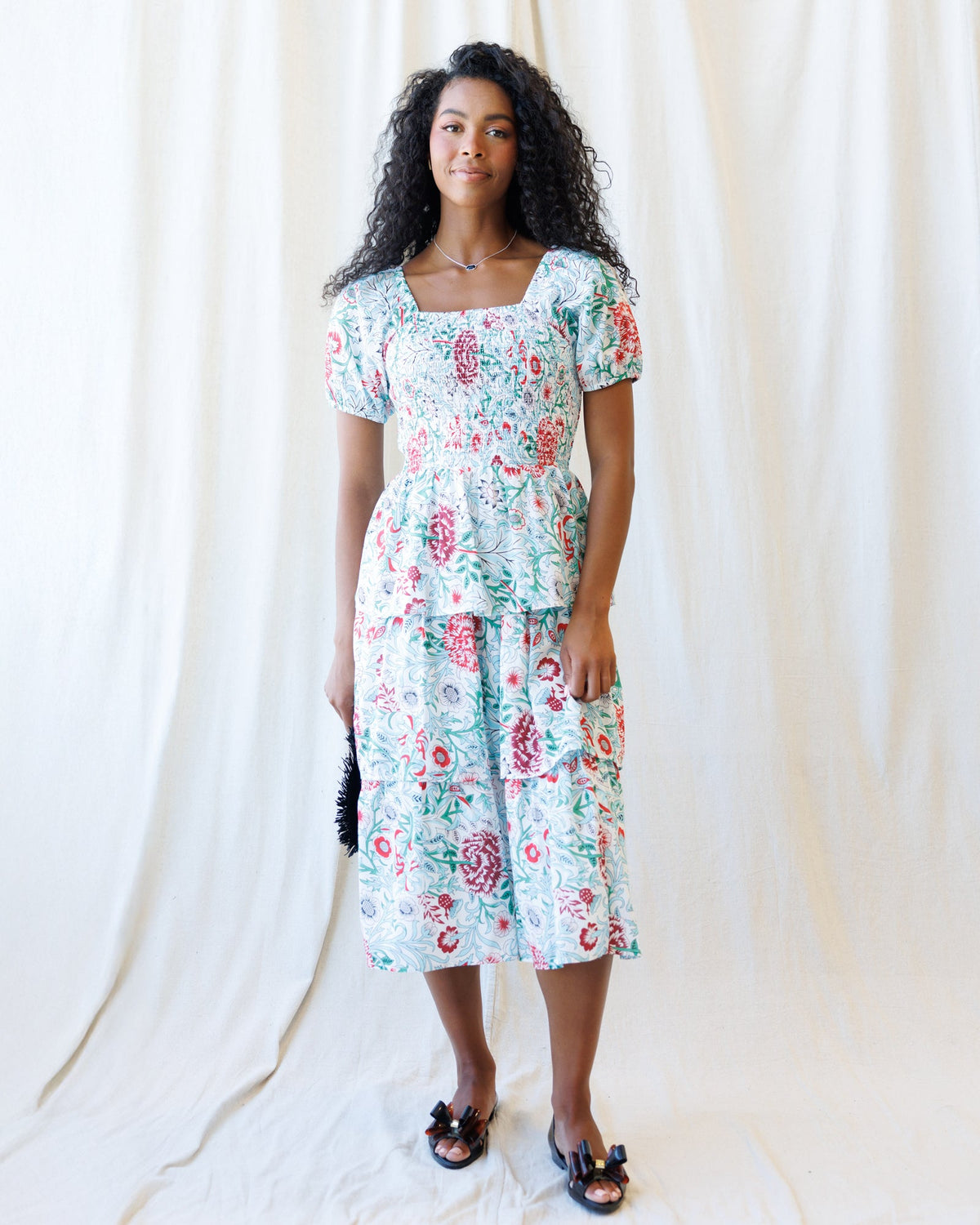Downeast Complimentary Colors Dress featuring a vibrant, multicolor pattern and flowing fabric, perfect for casual or semi-formal wear.