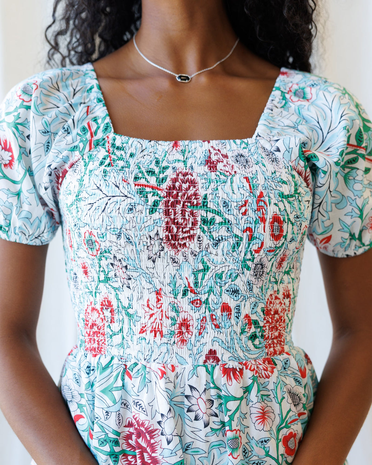 Downeast Complimentary Colors Dress featuring a flowy design with vibrant color patterns and a flattering fit.