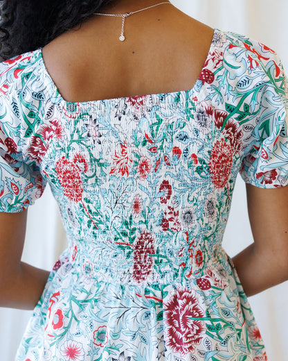 Downeast complimentary colors dress with a flowing design, featuring vibrant fabric and stylish details for a casual or semi-formal look.