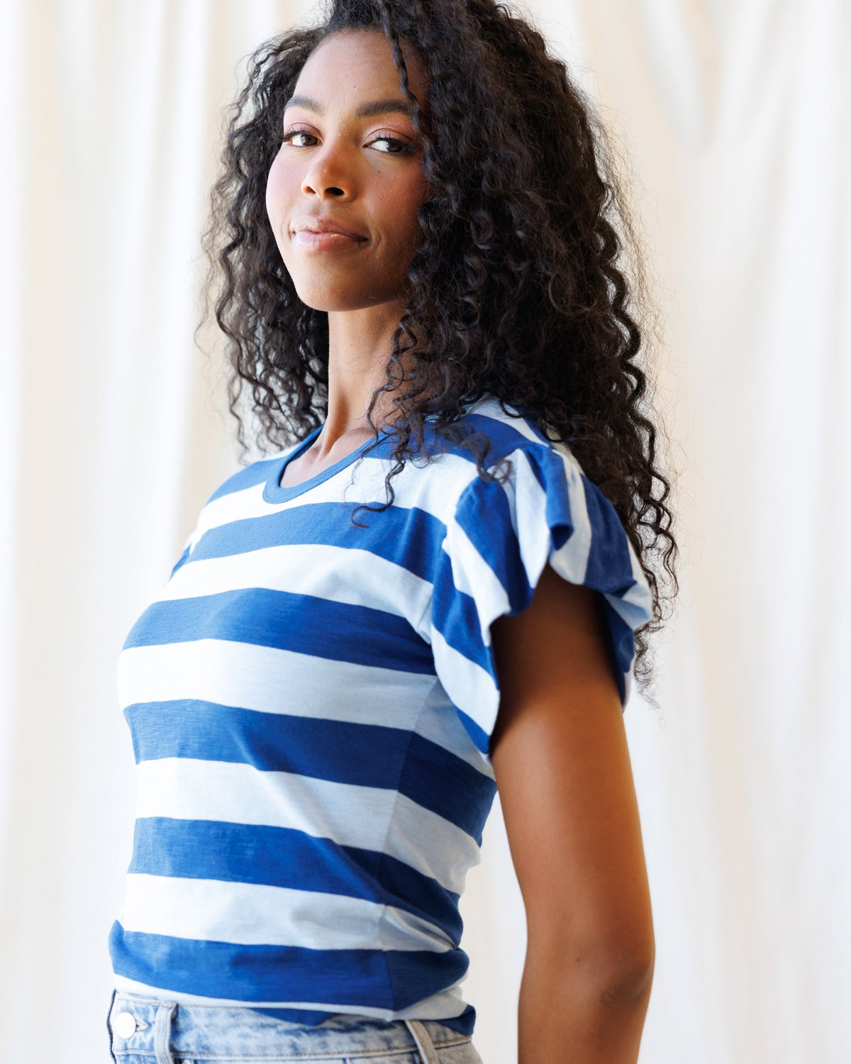 Downeast Charisma Tee, a stylish casual top in soft fabric with a relaxed fit, shown in a neutral color.