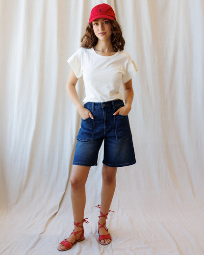 Downeast Charisma Tee, a casual tops with a comfortable fit, displayed on a hanger with neutral background.