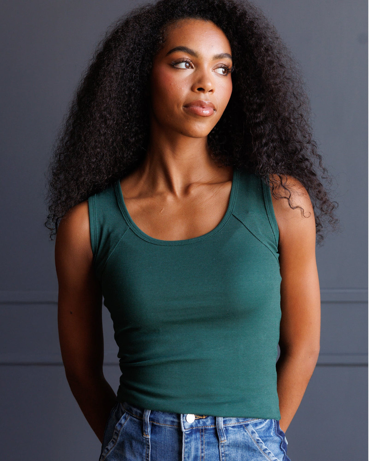 Downeast Everyday Tank top in neutral color, sleeveless design, lightweight fabric, casual style, close-up shot of the sleeveless top.