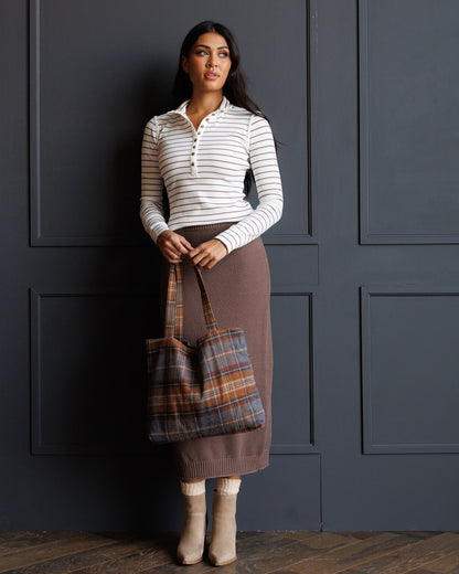 Downeast Carpe Diem skirt featuring a stylish design, shown laid flat with vibrant fabric details and a comfortable fit.
