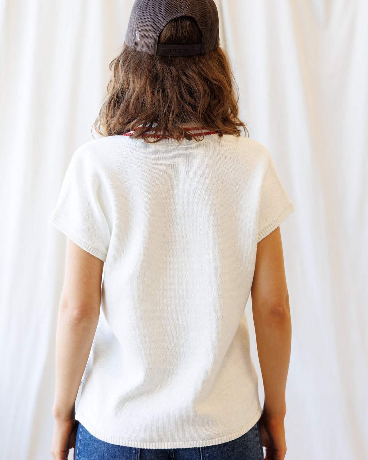 Downeast Atlantic vest, a cozy sweater with a quilted design and front pockets, perfect for casual wear.