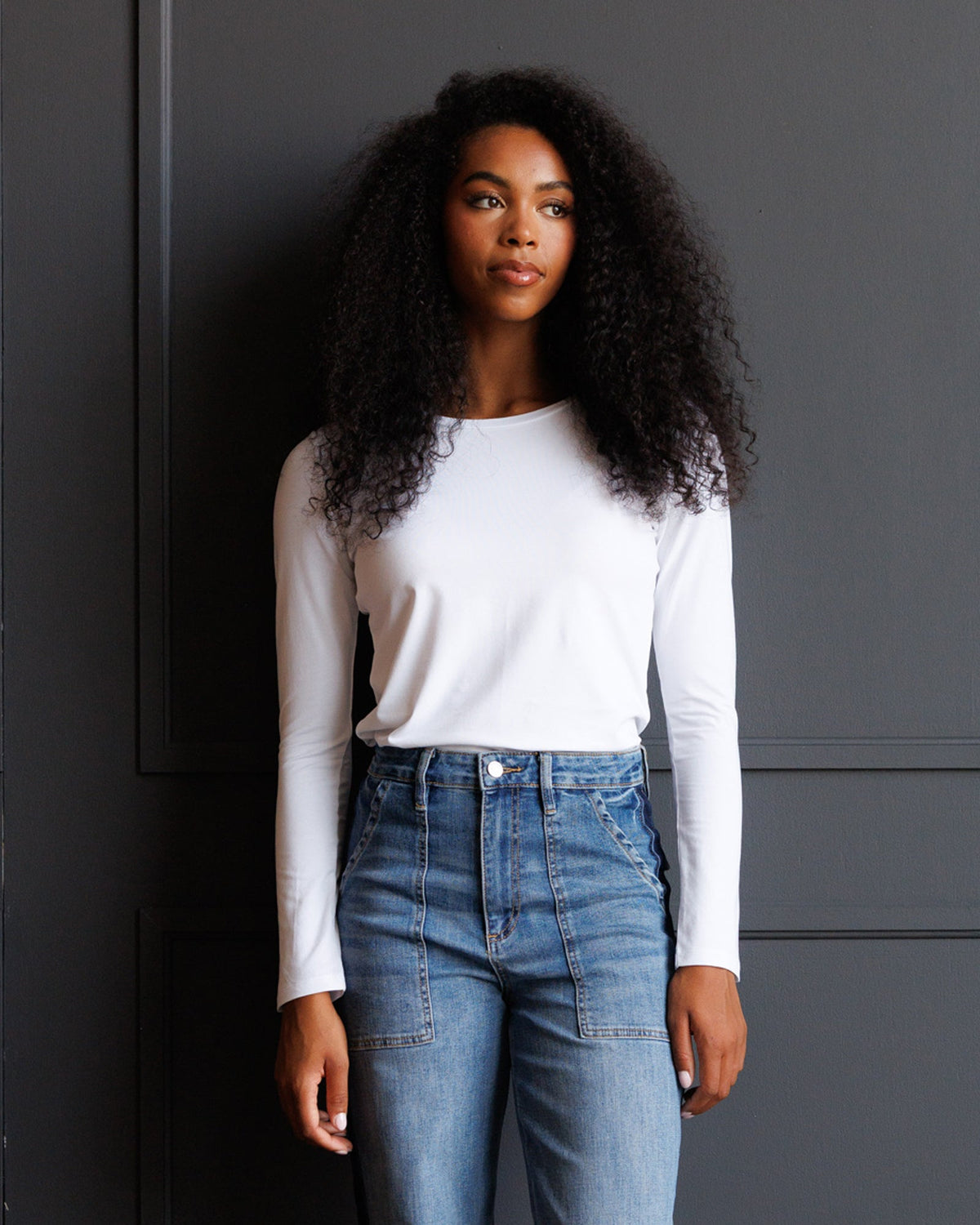 Downeast Essential Long Sleeve Tee in soft fabric, shown in a neutral color, featuring a classic fit and simple crew neckline.