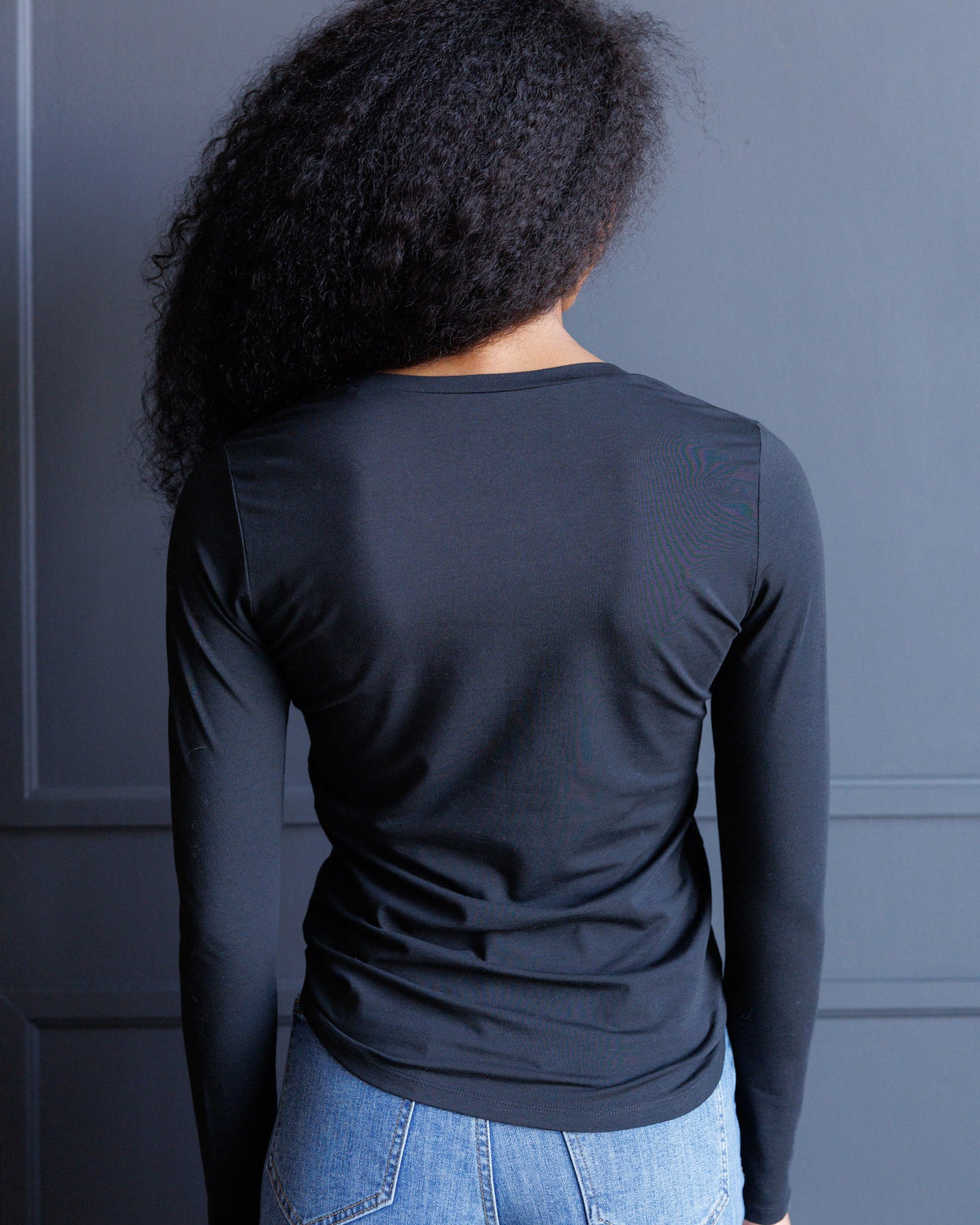 Downeast Essential long sleeve tee in soft fabric, featuring a classic fit and round neckline, shown in a neutral color.