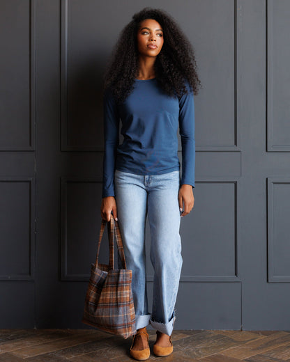 Downeast Essential Long Sleeve Tee in soft fabric, featuring a classic fit and ribbed cuffs, perfect for casual wear.